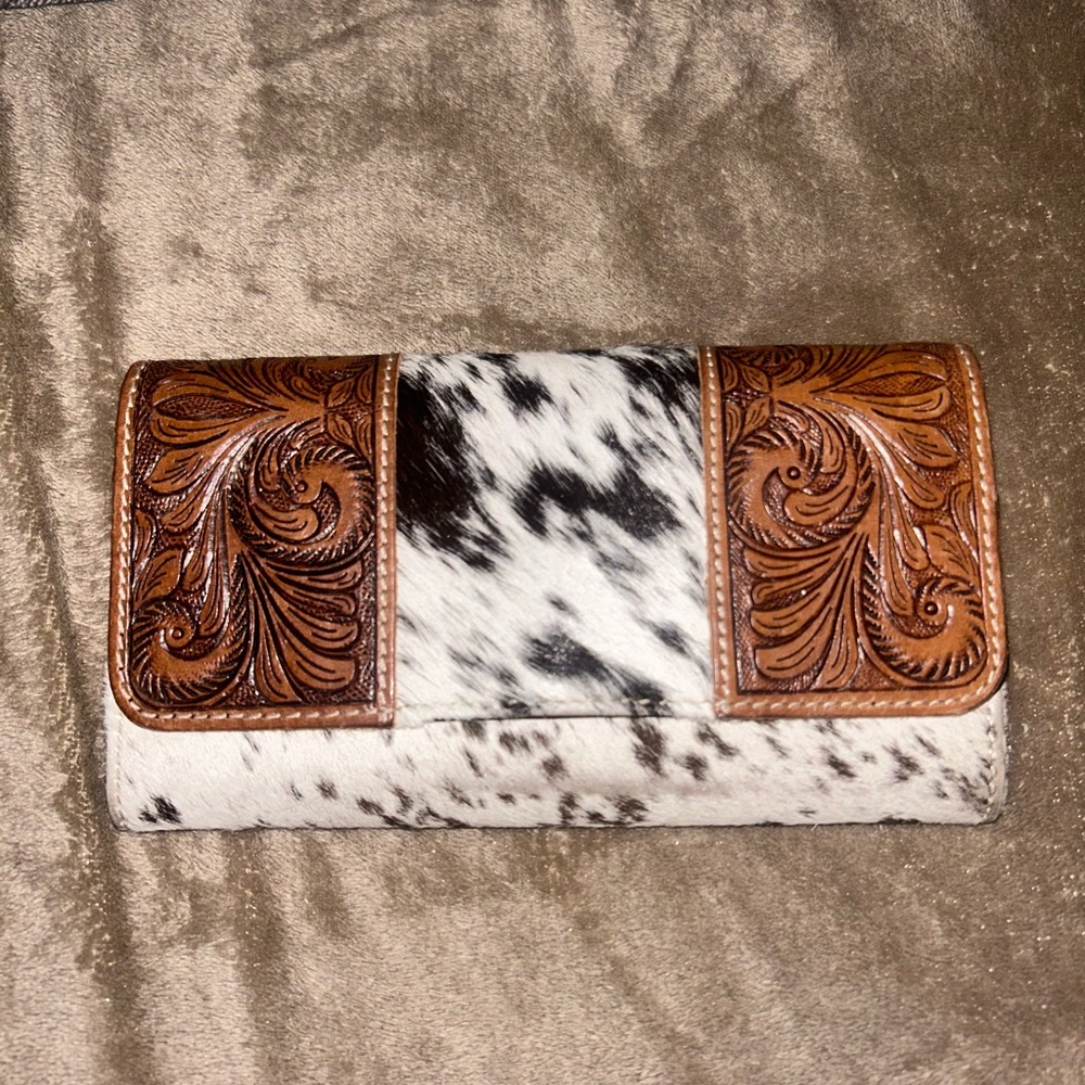 Cow print tooled leather wallet